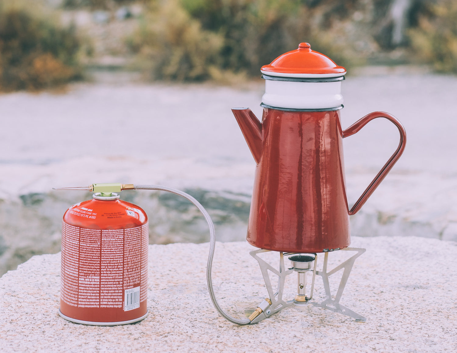 Enamelled traditional Spanish coffee pot on a gas burner