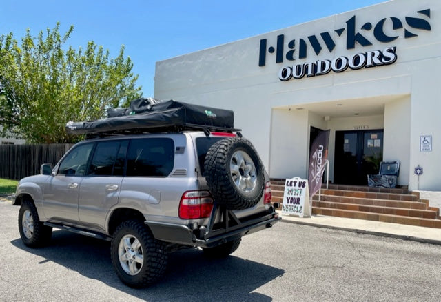 rear tire swing hitch preowned toyota land cruiser overland vehicle with tent for sale in san antonio texas at hawkes outdoors